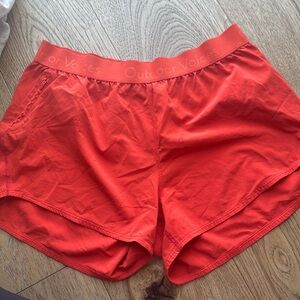 Outdoor voices orange shorts size medium
